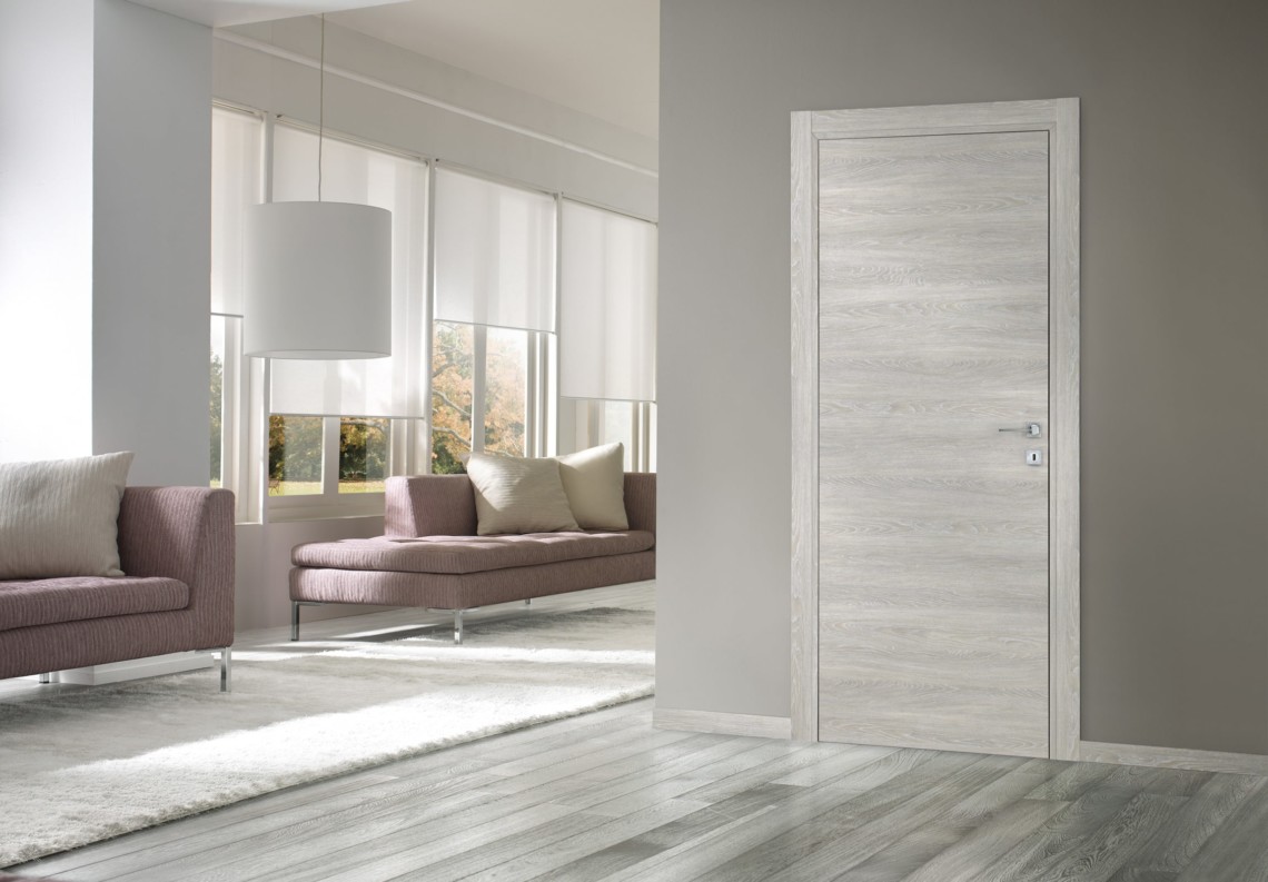 Porte moderne a battente Feel in essenza legno brina