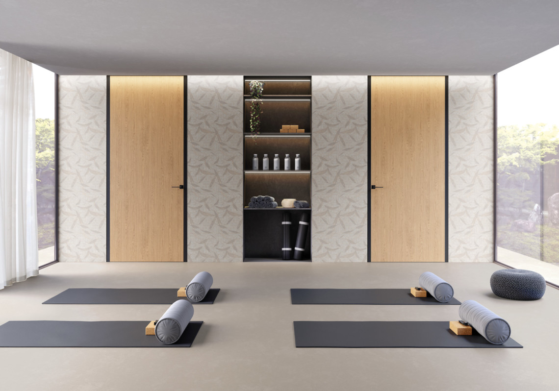 Sala Yoga con porte battenti: telaio Inner C1 e anta in finitura Naturoc Milled 44